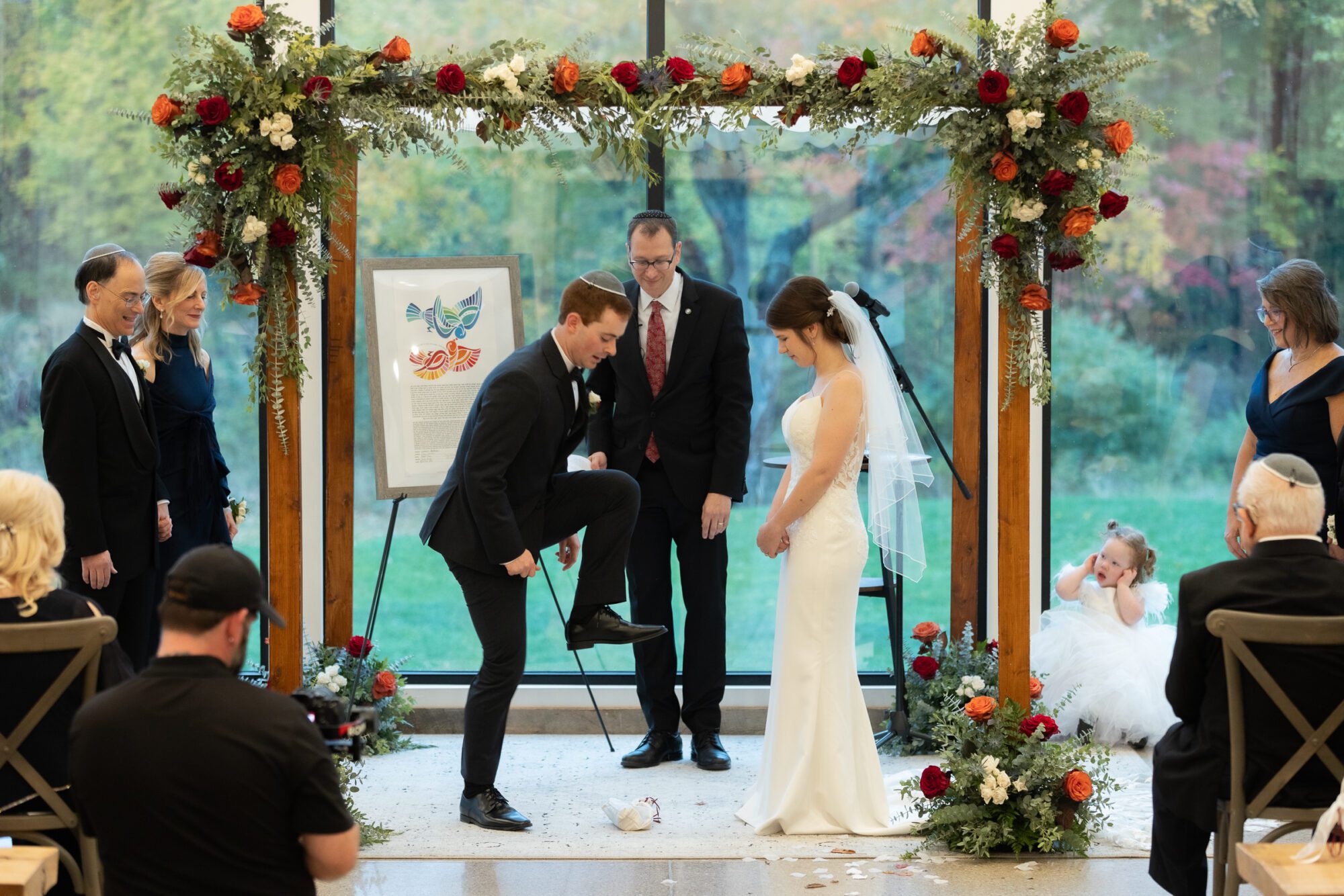 Jewish bride and groom's wedding ceremony, breaking the glass.