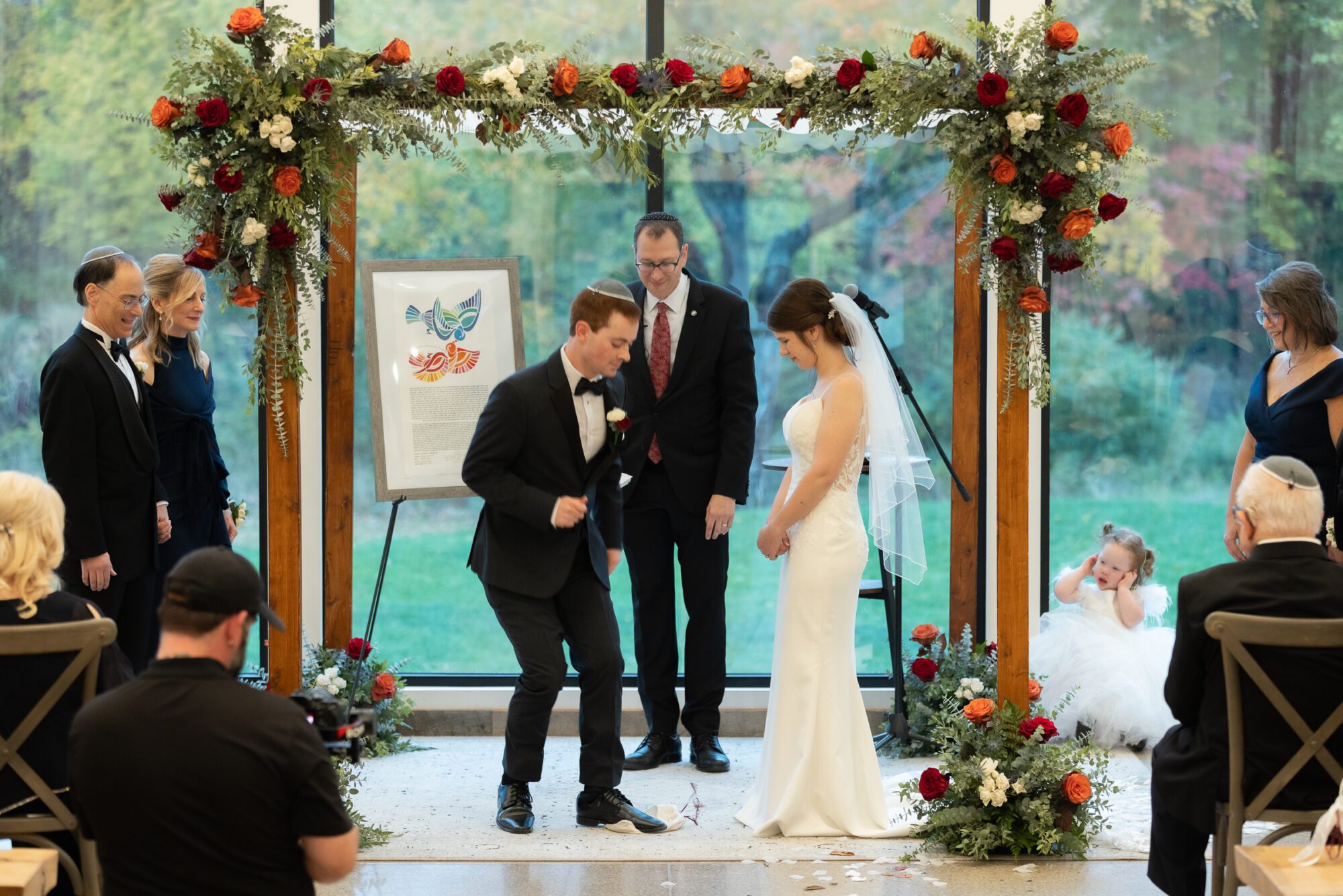 Jewish bride and groom's wedding ceremony, breaking the glass.