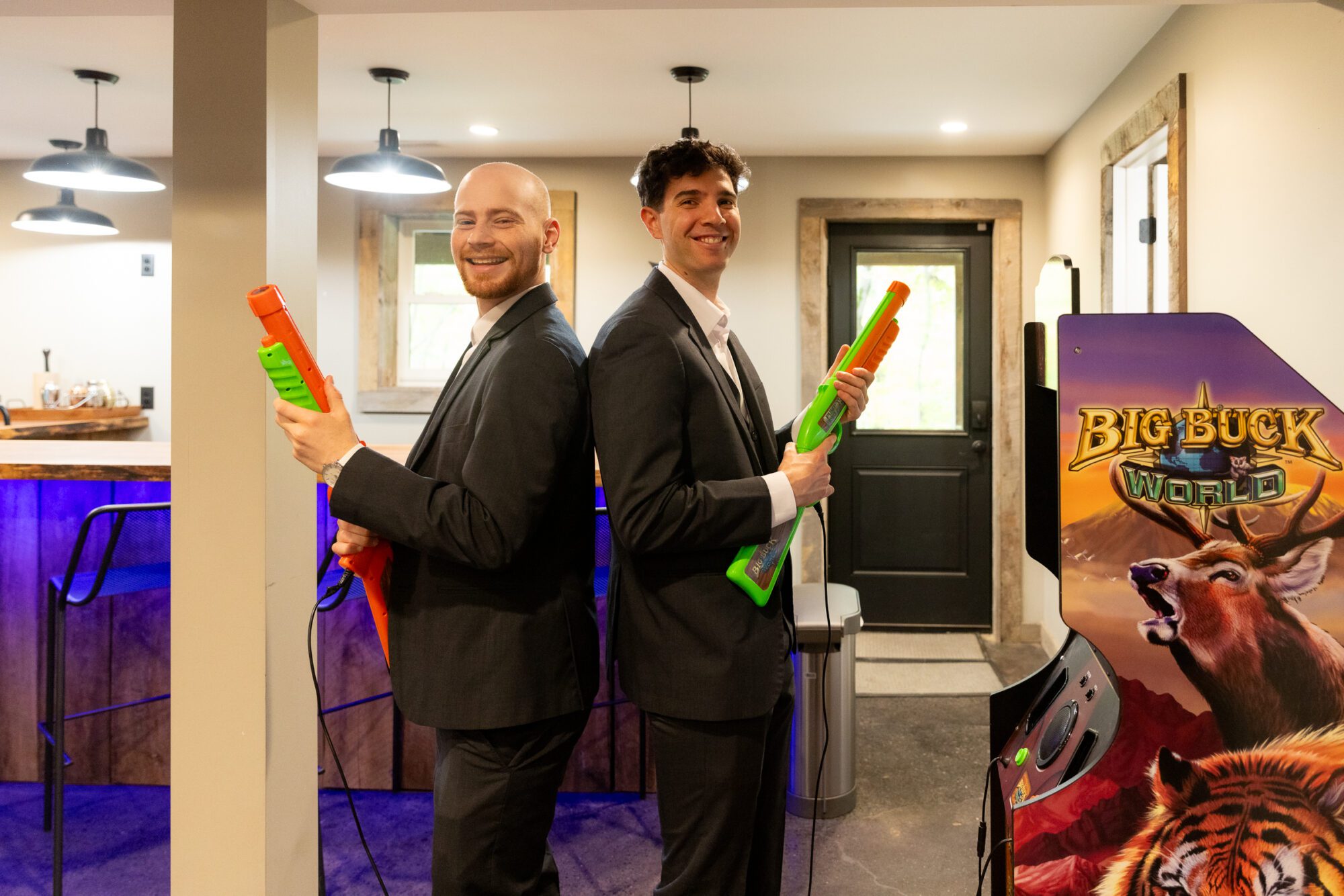 Jewish bride and groom's getting ready photos at Standing Rock Farms. Groomsmen playing around.