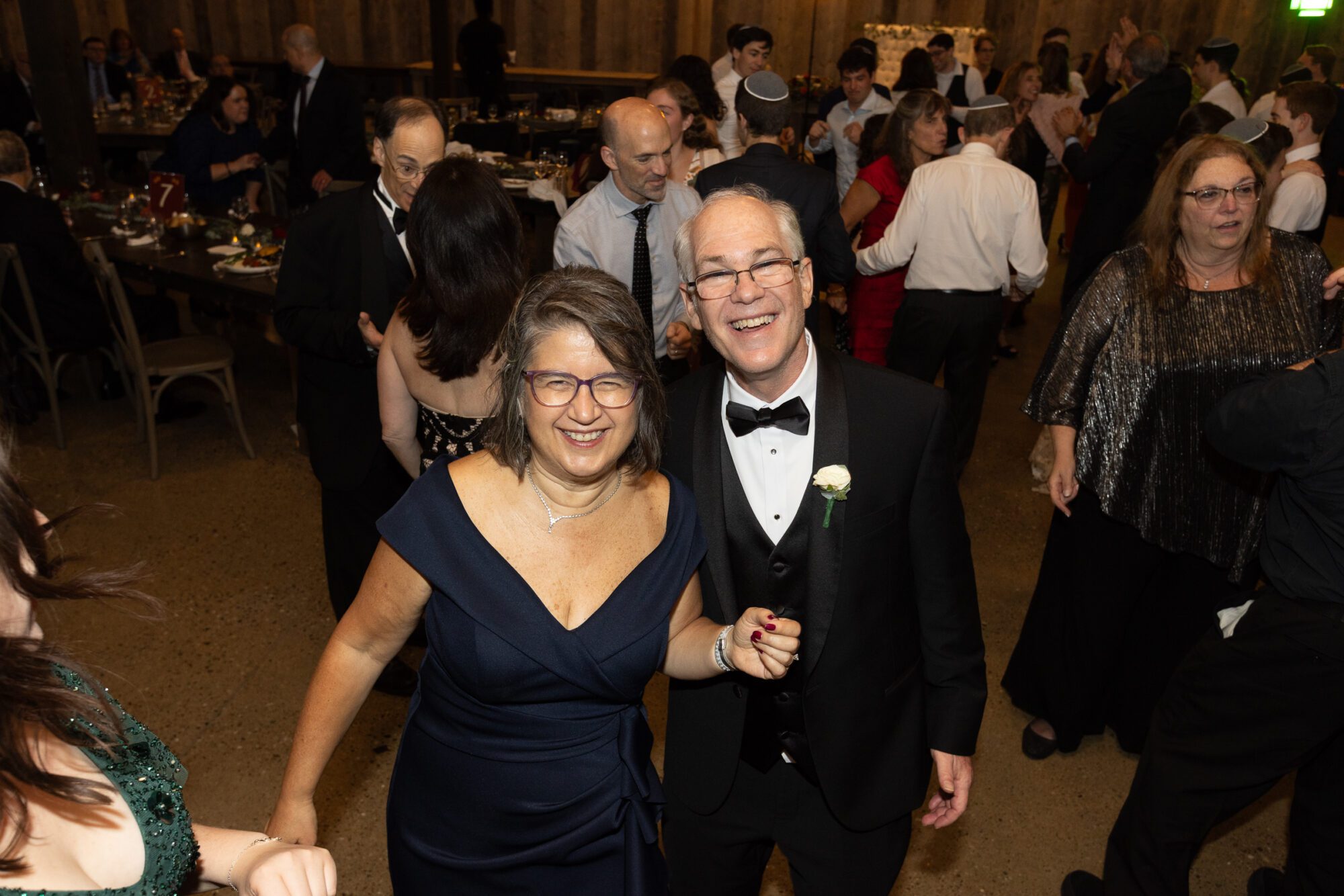 Jewish parents of the Bride dancing at wedding reception.