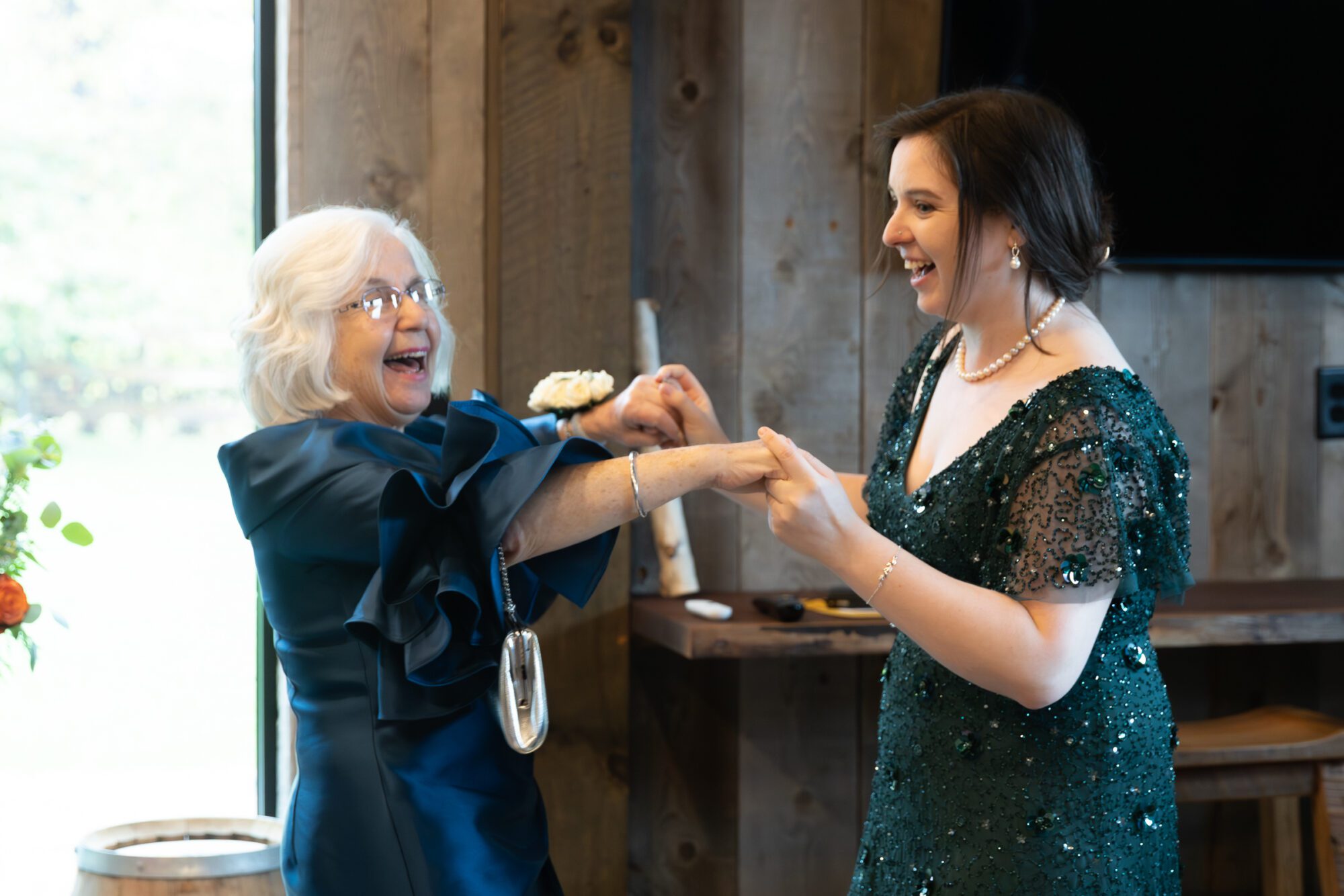 Jewish bride and groom's wedding ketubah signing ceremony. Grandma and cousin dance.
