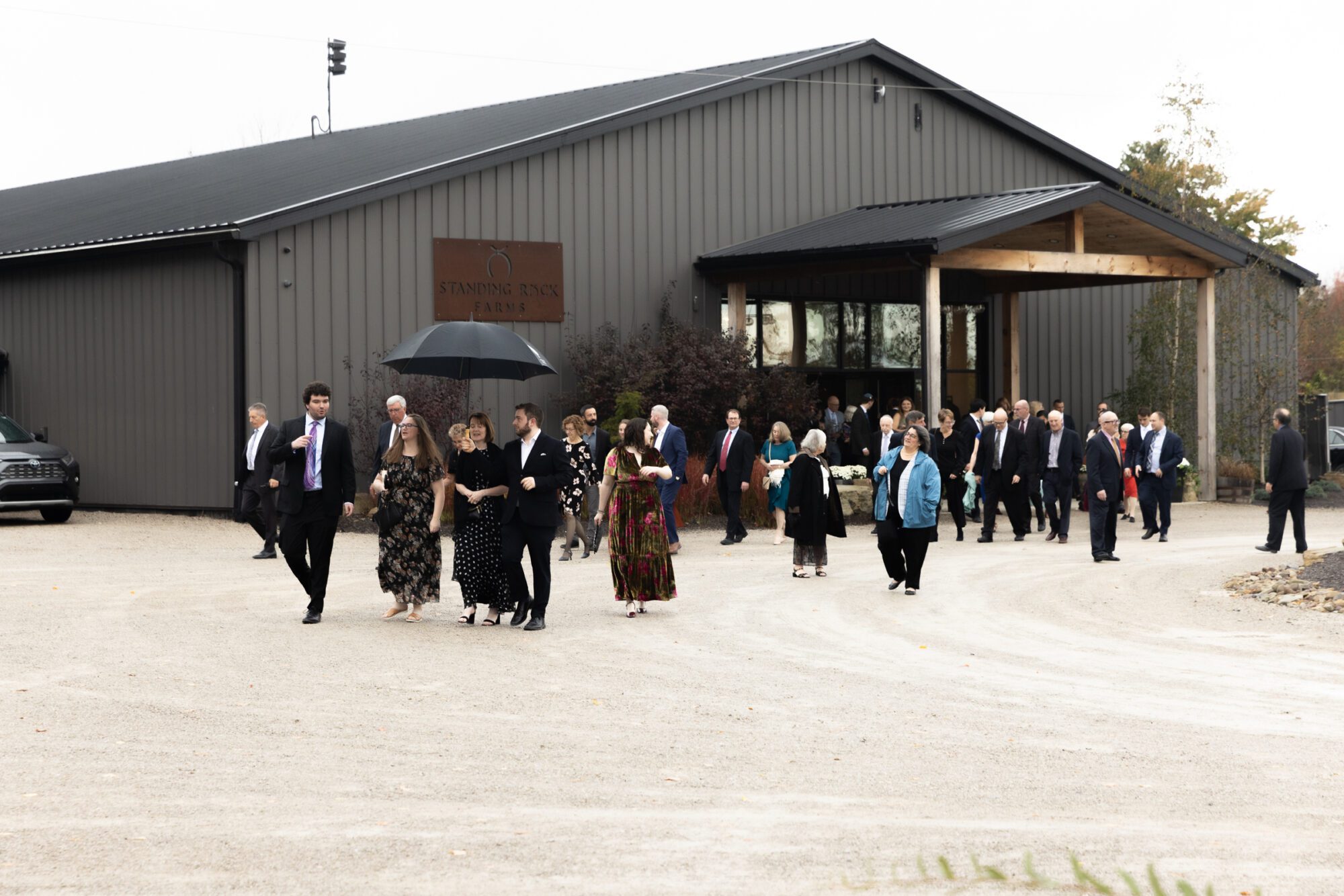 Jewish bride and groom's wedding ceremony. Guests walking to ceremony.