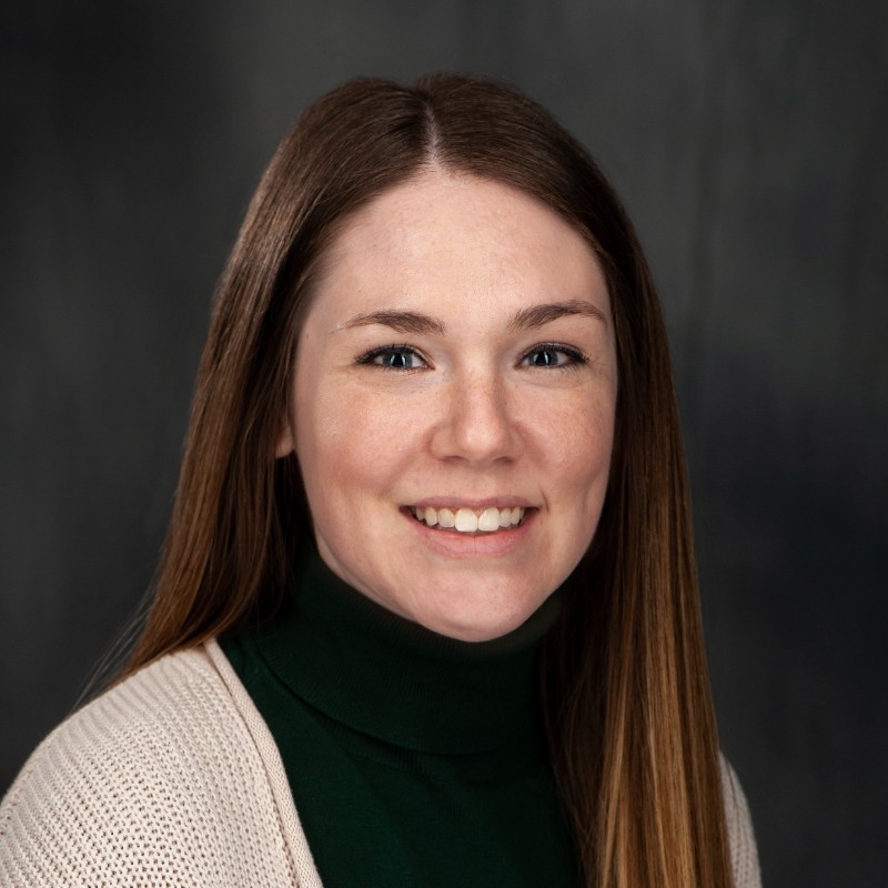 Erin Stewart (Burke), Lead Cinematographer at Mystic Image, smiling in a professional studio headshot.